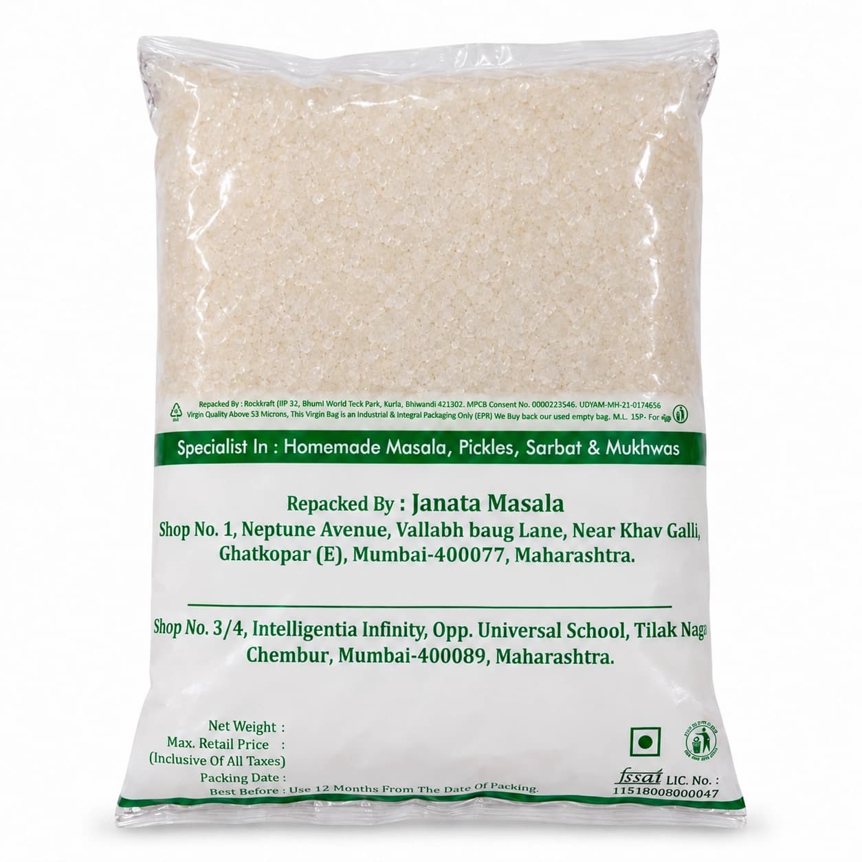 Janata Masala medium crystal sugar in a clear pack, back view